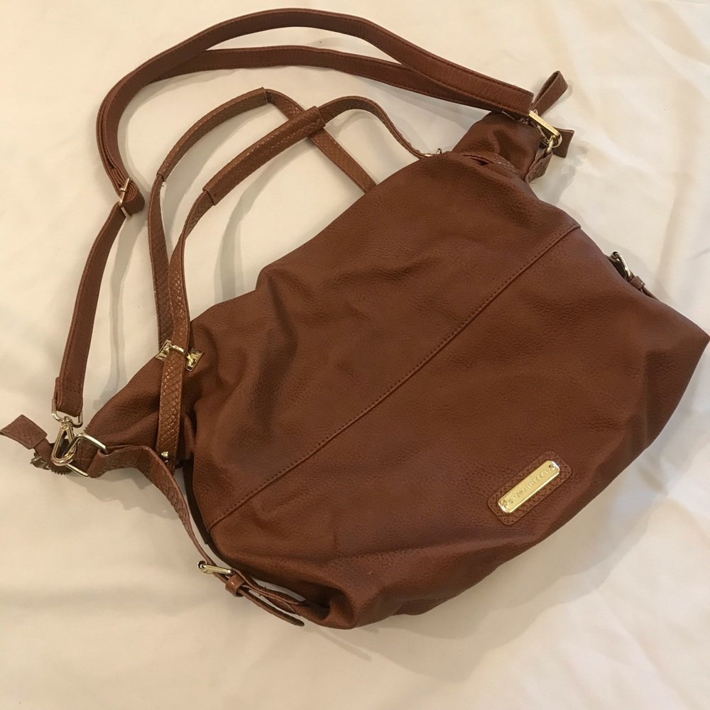 Steve Madden -  over the shoulder and side step